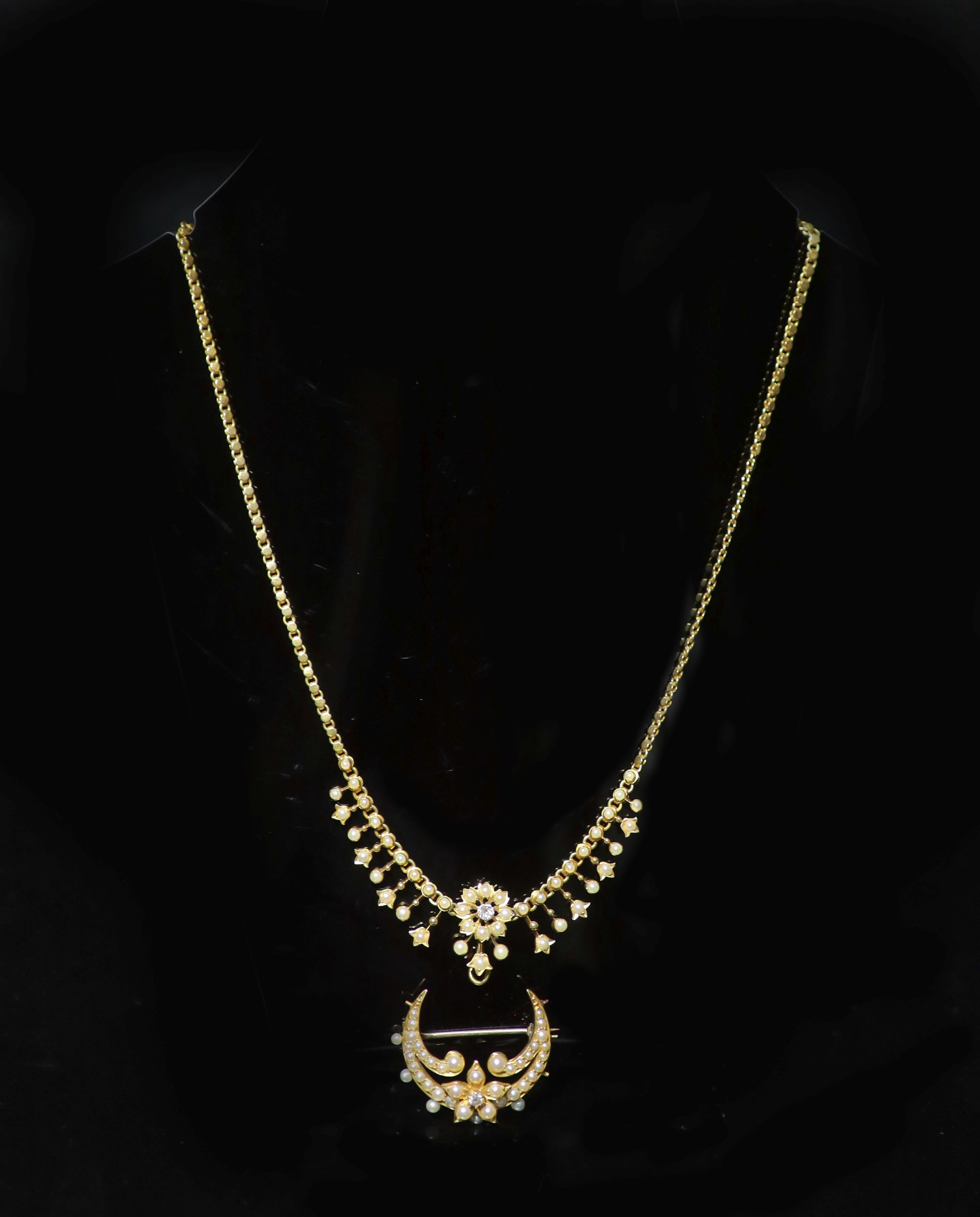 A Victorian gold, pearl and diamond set necklace, lacking drop, together with a similar crescent brooch